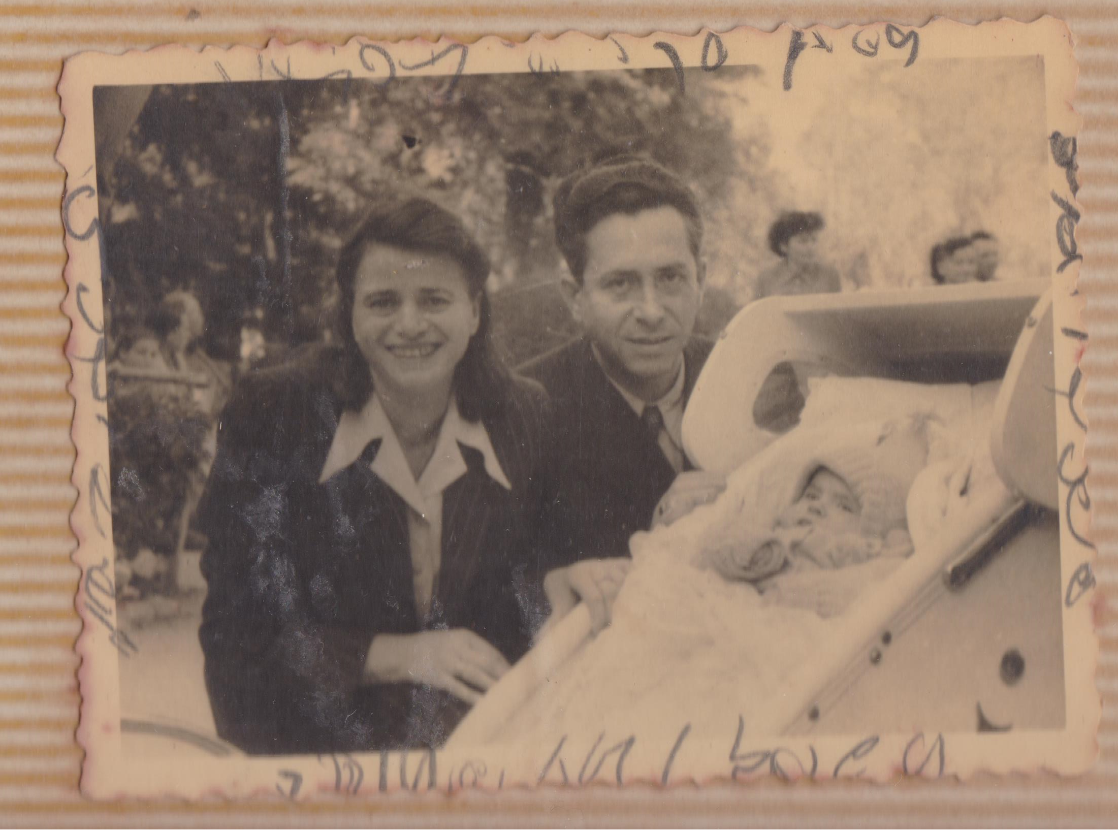 Zvi and Ester Freiman with a baby